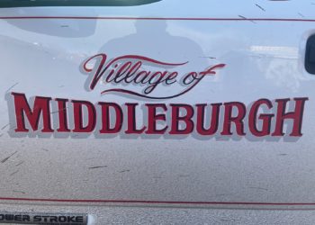 Picture of a red "Village of Middleburgh" decal on a white truck